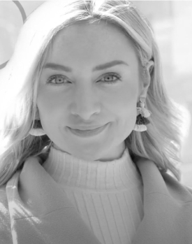 blonde woman smiling at camera close up