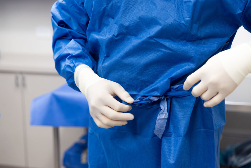 Dr. Pearlman Surgical tightening their pants for procedure