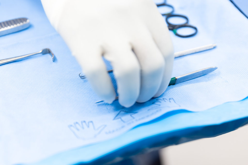 Dr. Stein Surgical tool being taken