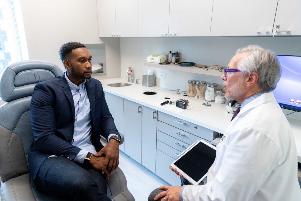 Dr. Pearlman with patient for rhinoplasty consultation