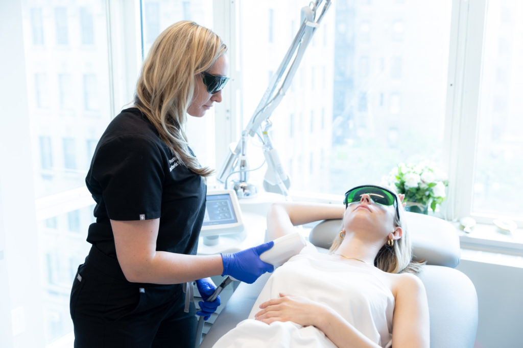 Laser Hair Reduction procedure being worked on patient by specialist with