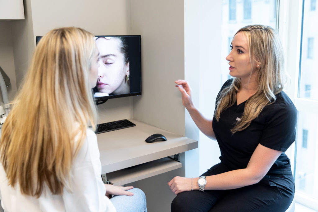 Visia with specialist talking to patient